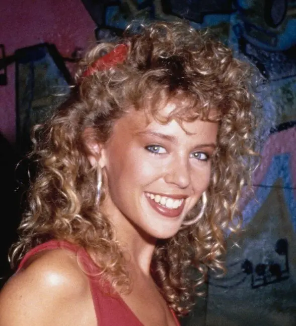 dents de kylie minogue en 1987