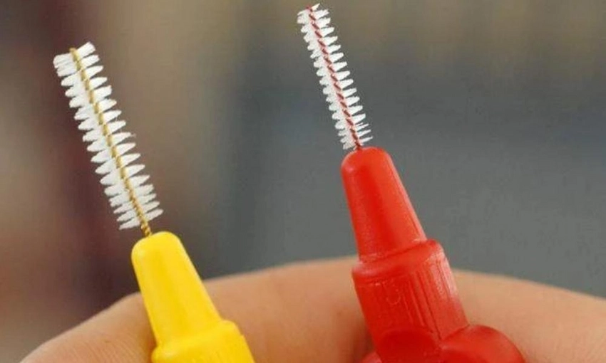how to use an interdental brush