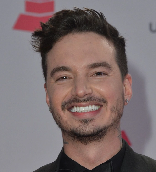 j balvin teeth in 2015