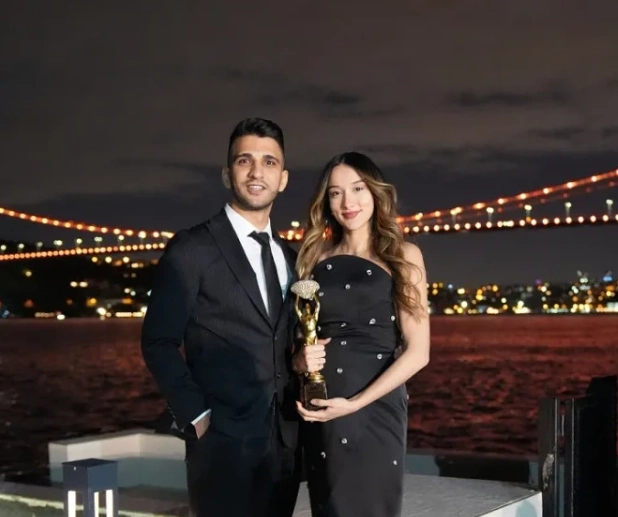 dr polen akkilic is with an award