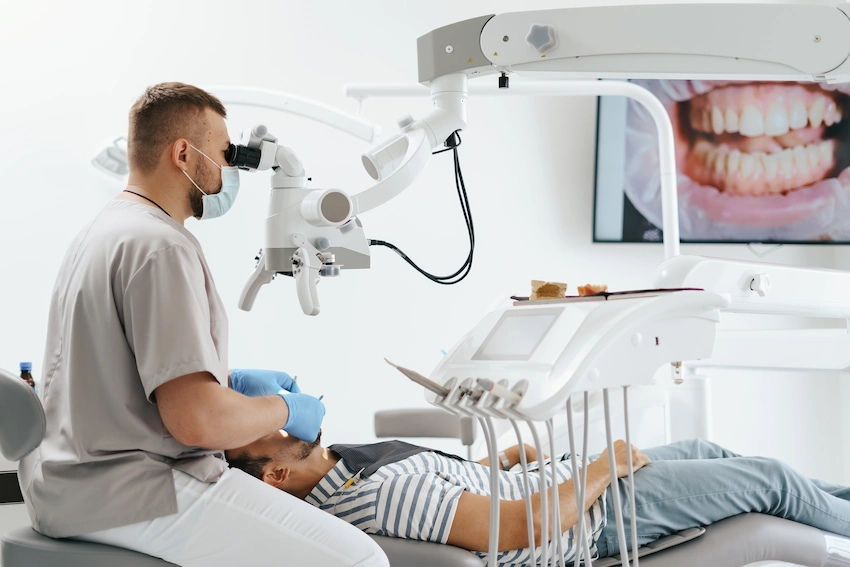 what is root canal treatment under the microscope