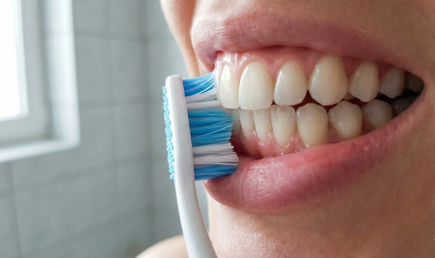 hard brushing cause gum recession