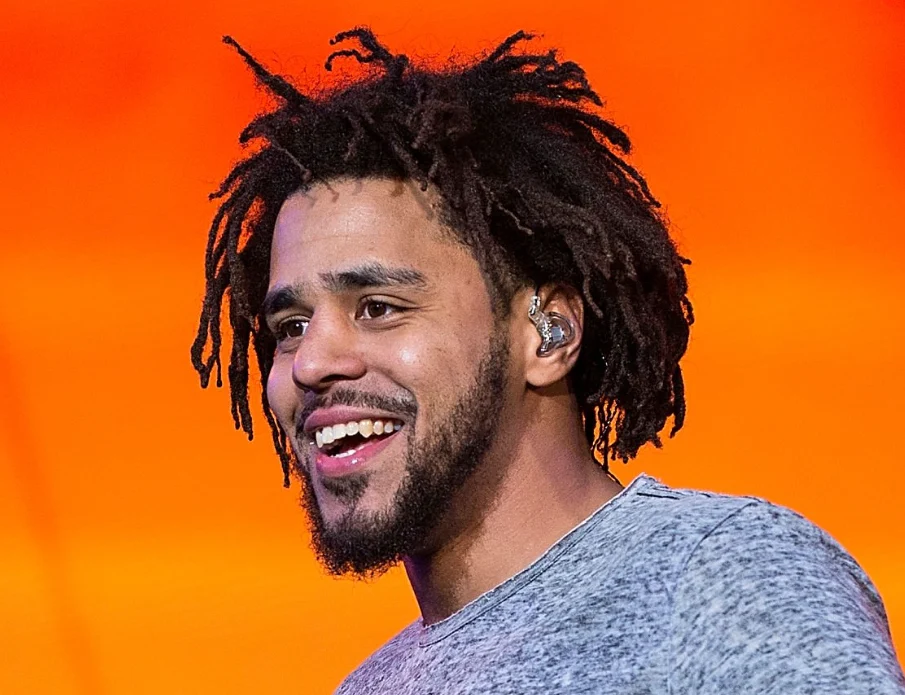 sonrisa de j cole en 2016