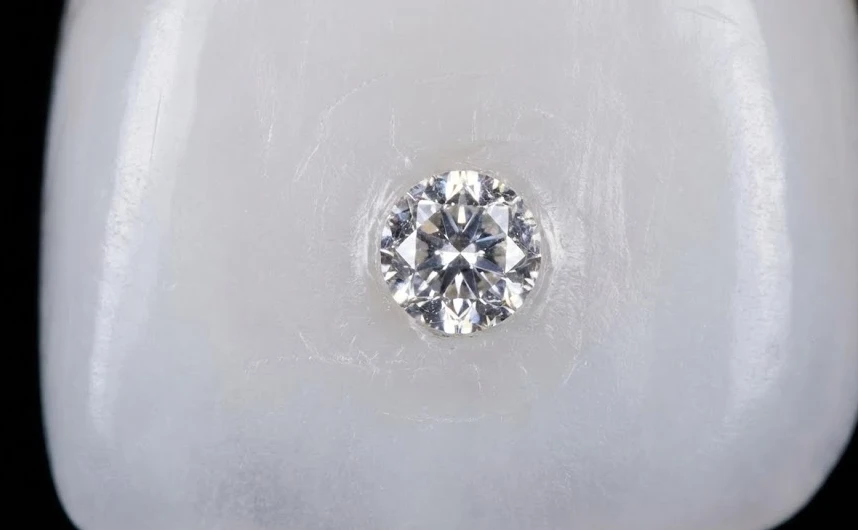 a diamond gem bonded to porcelain