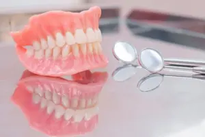 can dentures really stay in without adhesive the clinical truth