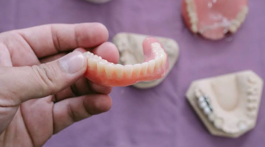 can you use denture adhesive every day