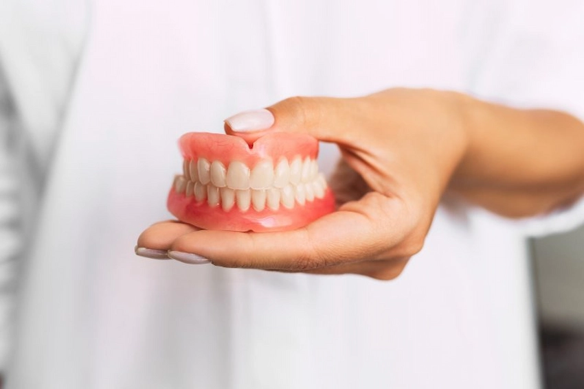 how does powder denture adhesive work how does powder denture adhesive work